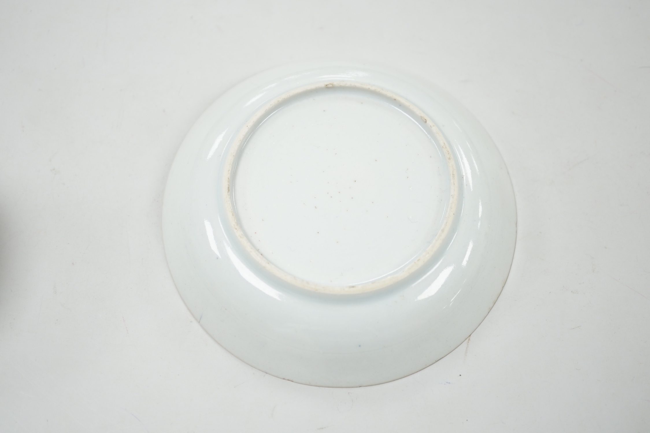 A Chinese famille rose cup and saucer, Qianlong period, saucer 12cm diameter